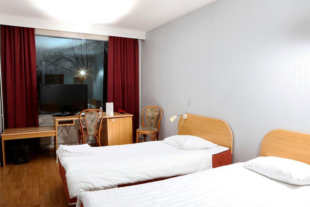 Finlandia Hotel Isovalkeinen Куопио Экстерьер фото