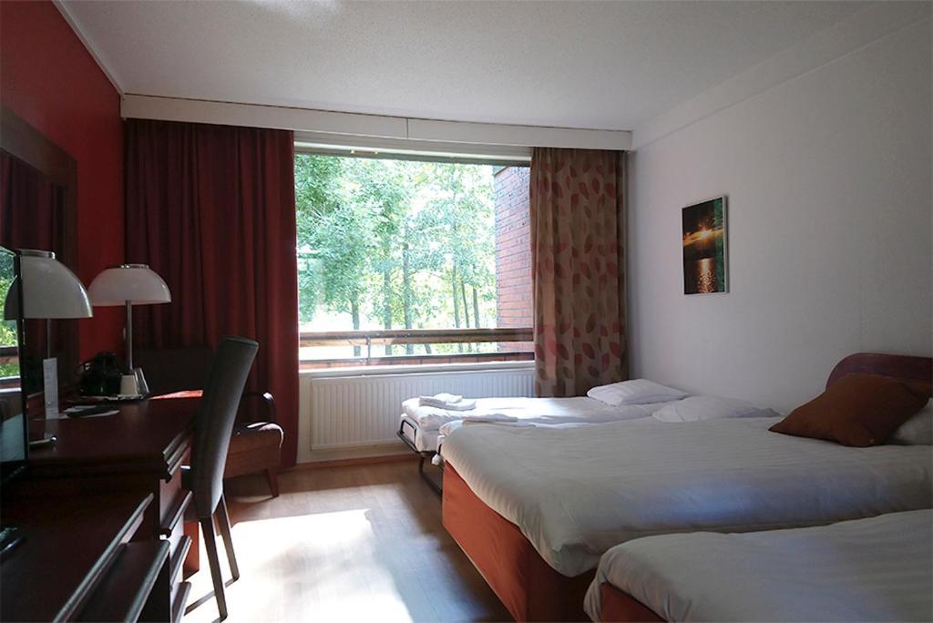 Finlandia Hotel Isovalkeinen Куопио Экстерьер фото